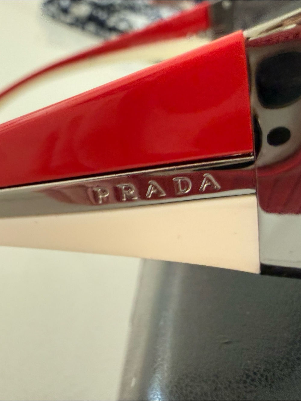 Prada Rimless Shield Sunglasses in Clear Gradient with Red/White stripe - Picture 7 of 11